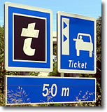 Take a ticket sign on French autoroute tolls
